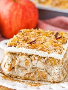 A slice of cinnamon apple icebox cake on a white plate.