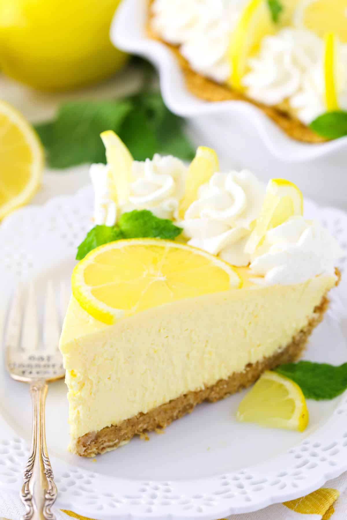 A slice of lemon mascarpone cream pie on a white plate.