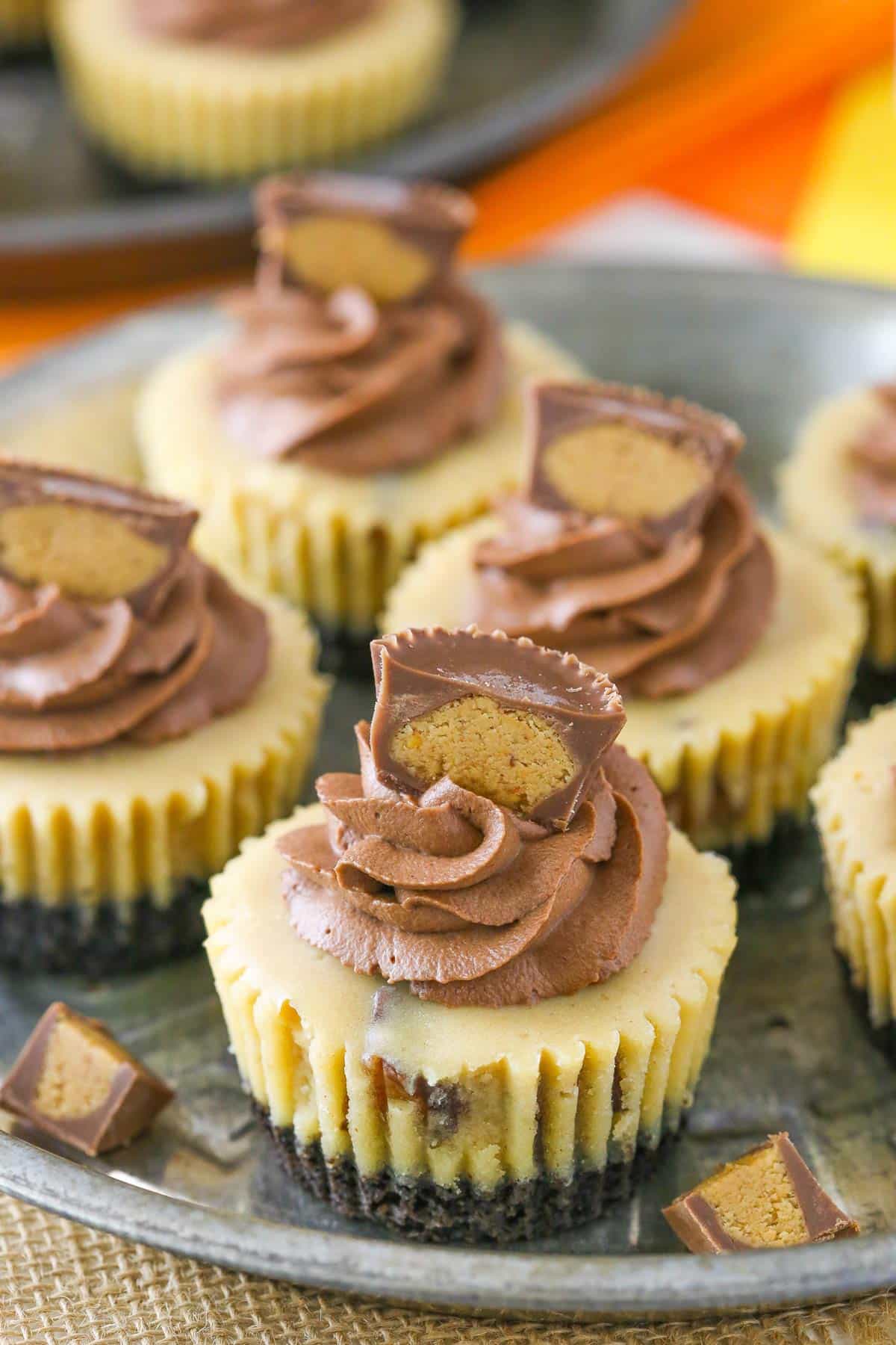 Close up of a mini Reeses peanut butter cheesecake on a silver tray.