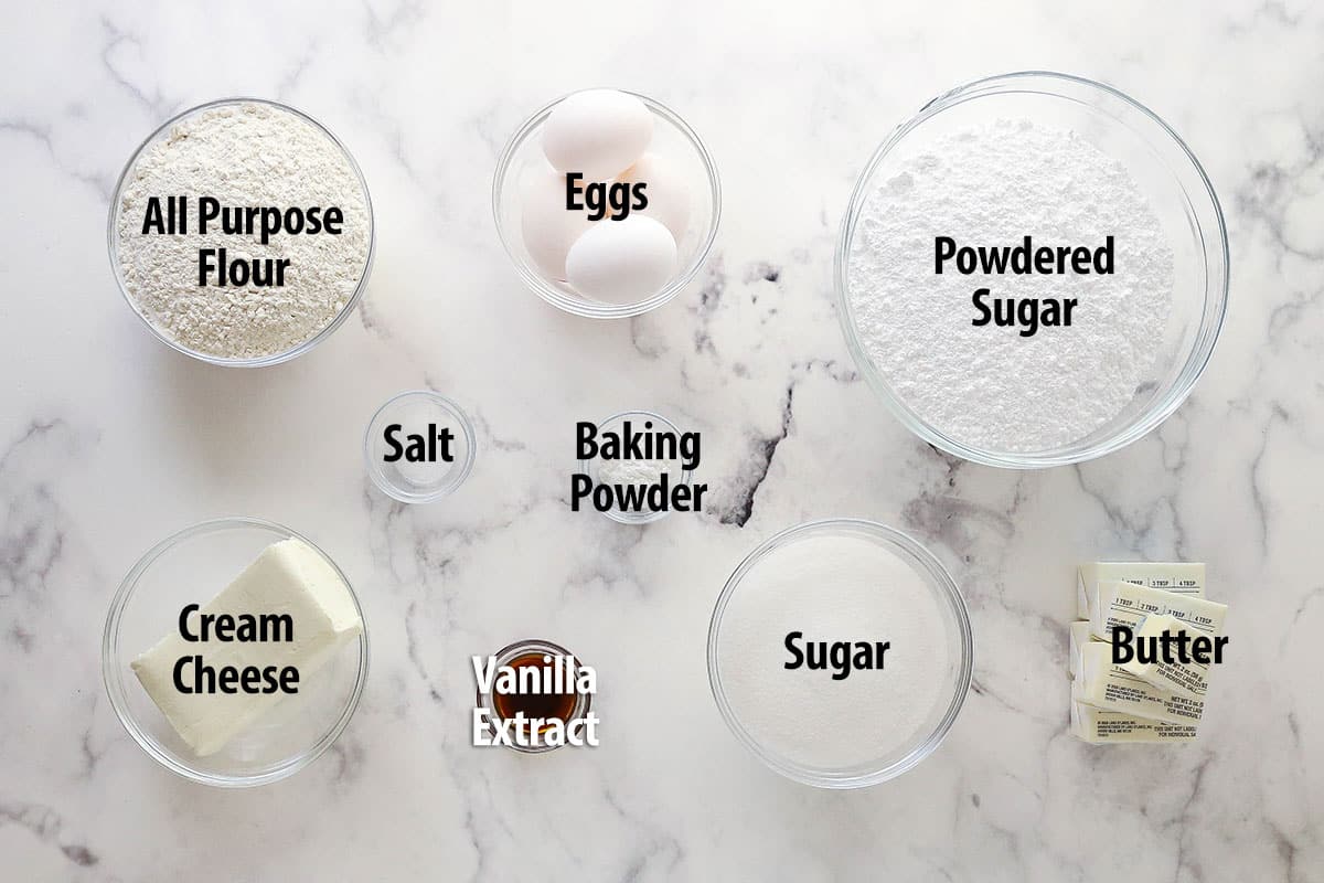 This from scratch Ooey Gooey Butter Cake is 100% irresistible with a rich, buttery, super moist cake layer and a silky cream cheese topping. Ingredients for ooey gooey butter cake, labeled.