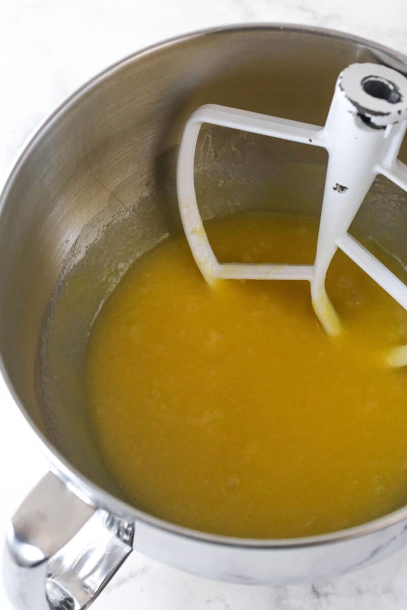 Whisking together the butter, sugar, eggs, and vanilla for ooey gooey butter cake.