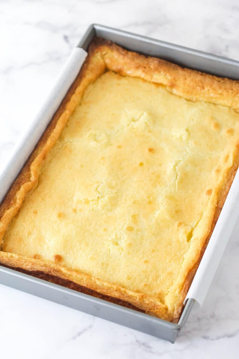 Ooey gooey butter cake cooling in the pan.