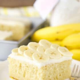 A slice of banana cake on a plate.
