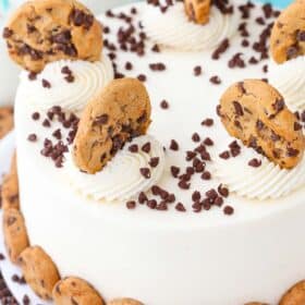 Close up of a milk and cookies layer cake.