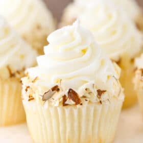 Close up of an almond amaretto cupcake.
