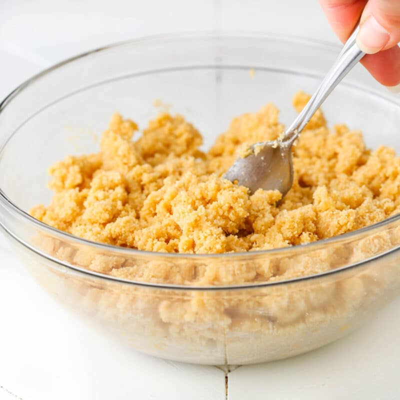 A bow of no bake champagne cookie pop filling that has been mixed.