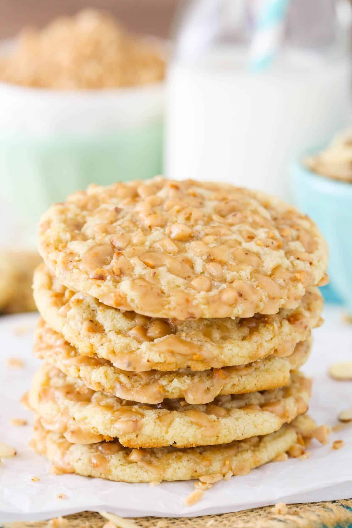 Close up of a stack of five gluten free toffee almond cookies.
