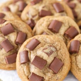 Close up of a pile of mocha chocolate chunk cookies.
