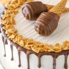 Close up of the top of a peanut butter chocolate ice cream cone cake.