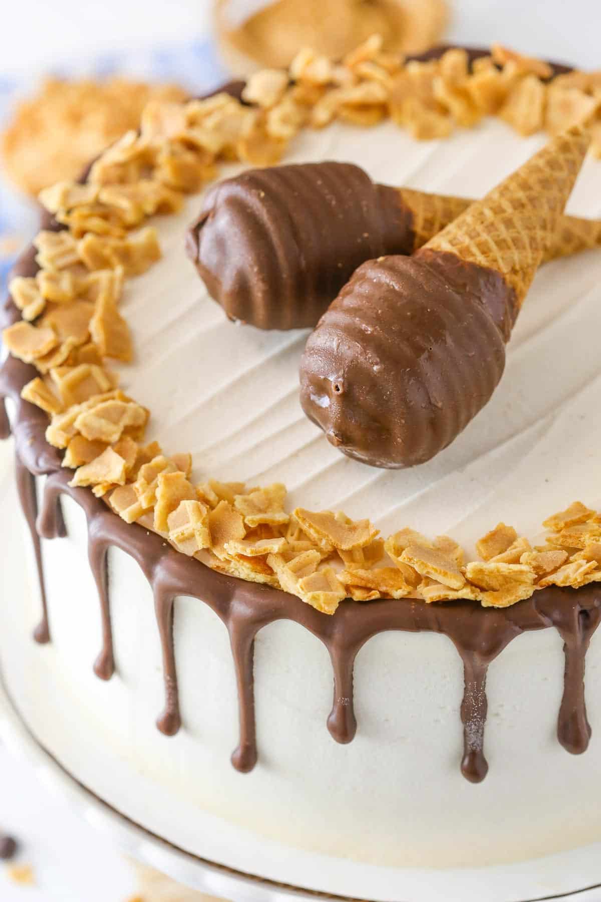 Close up of the top of a peanut butter chocolate ice cream cone cake.