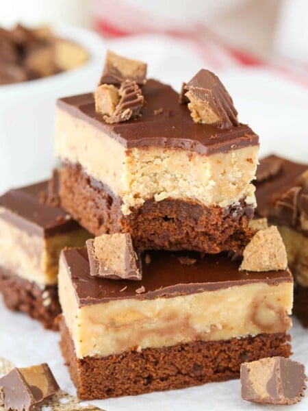 Close up of a brownie with a bite taken out of it.