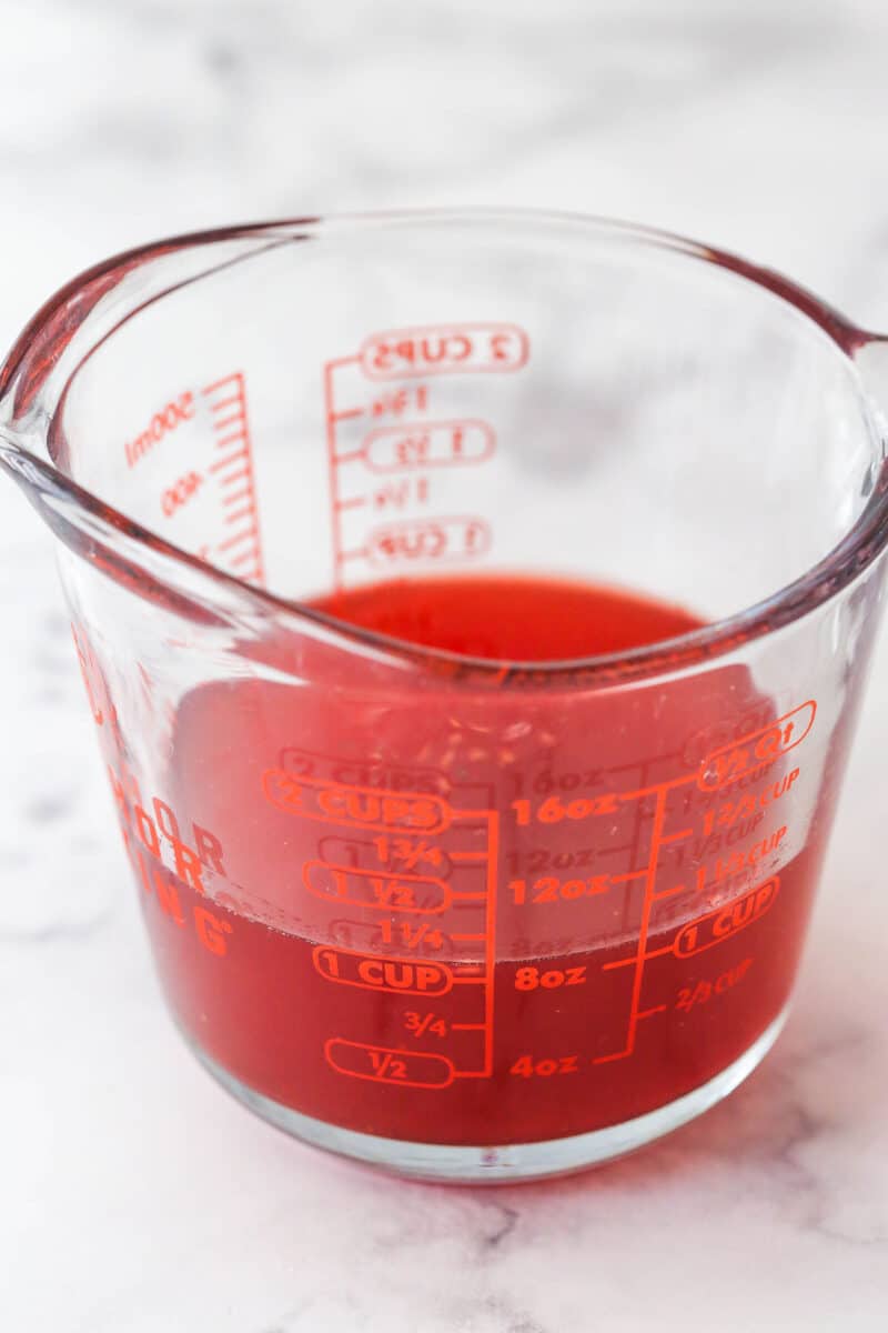 berry juices in a measuring cup