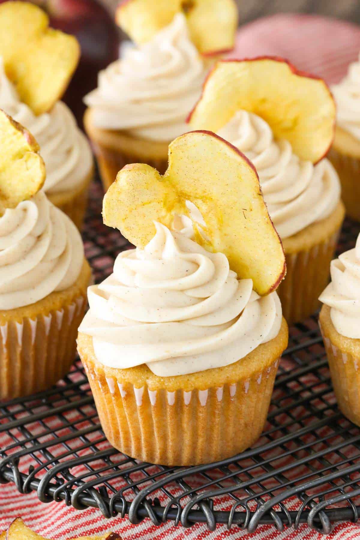Close up of apple butter cupcakes on a wire rack.