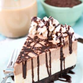 A slice of frozen Irish cream mousse cake on a plate.