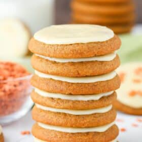 A stack of gingerbread cookies with eggnog icing.