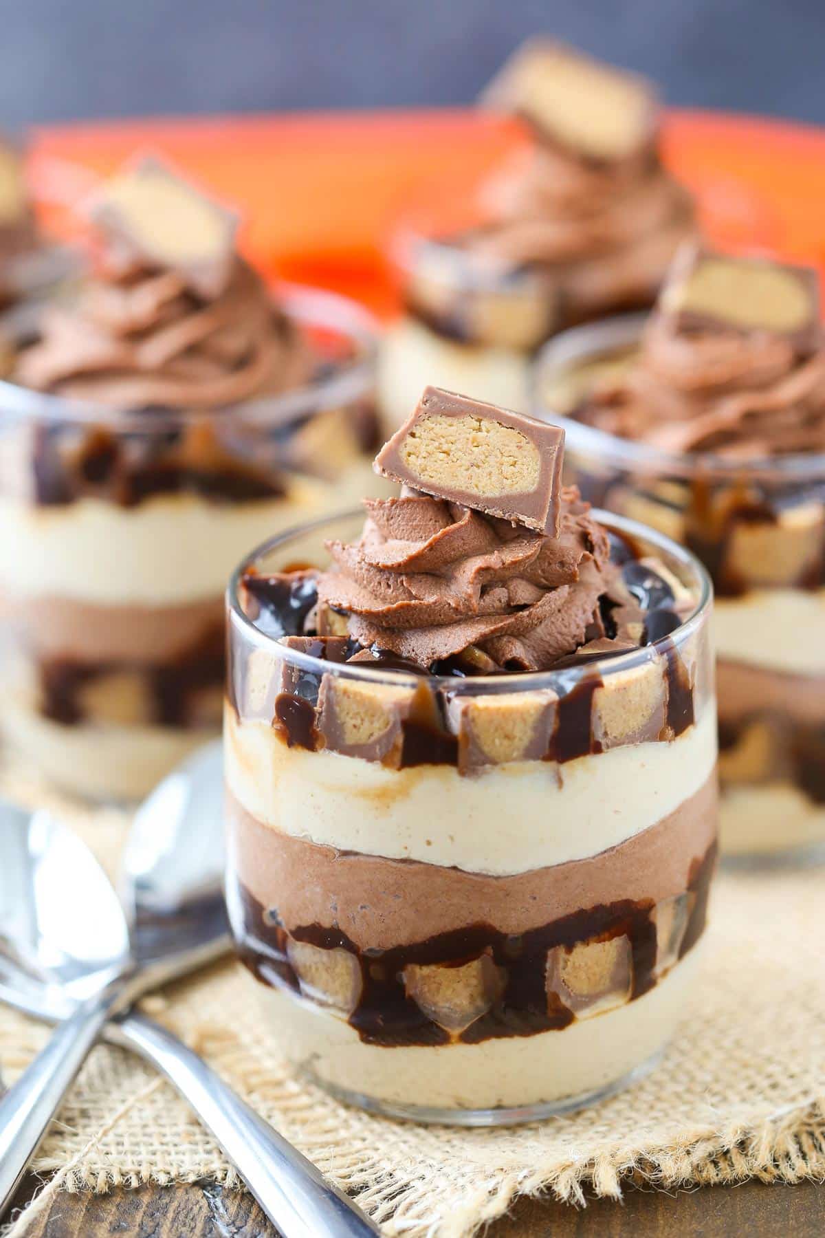 Side view of a mini Reeses chocolate peanut butter cheesecake trifle.