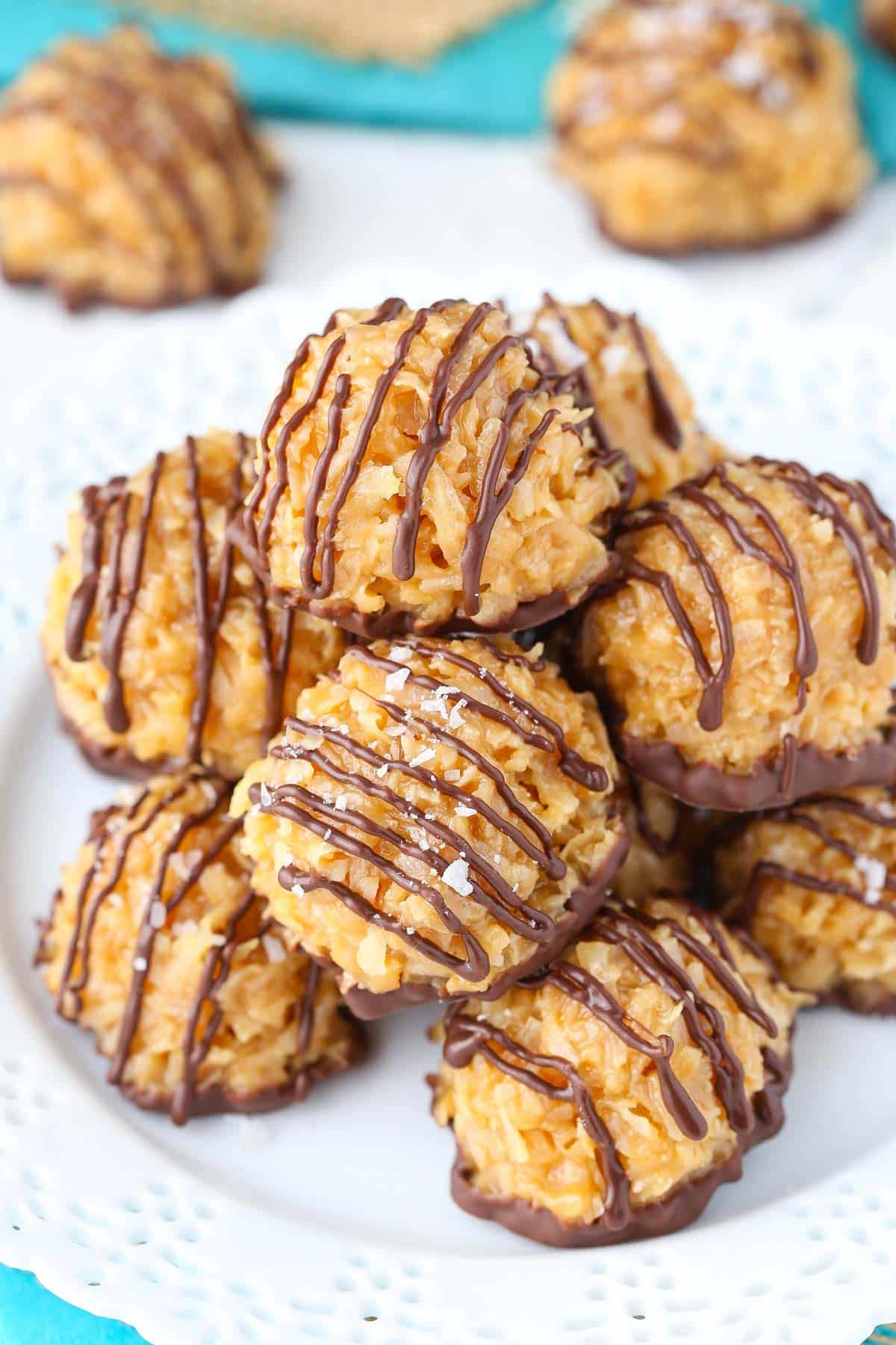 A pile of no bake salted caramel macaroons on a white plate.