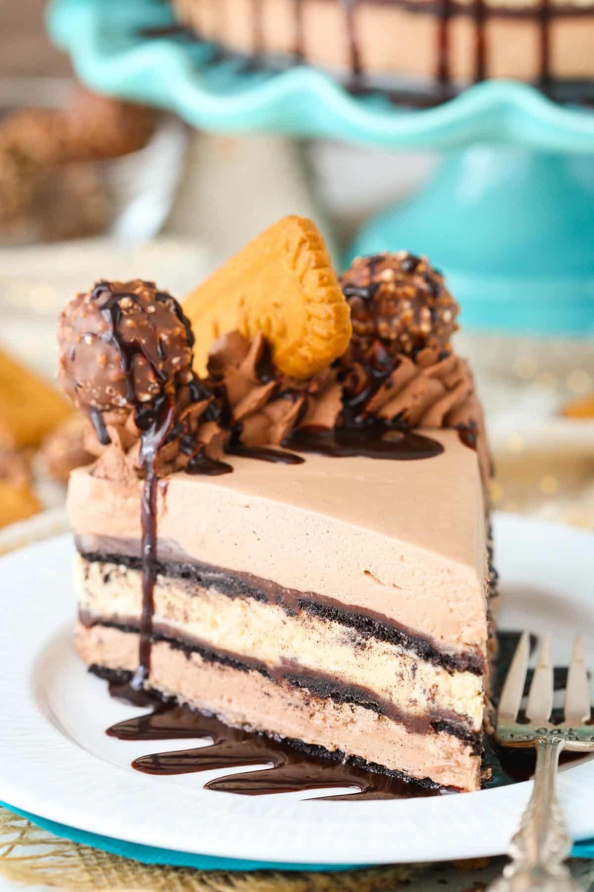 A slice of Nutella Biscoff icebox cake on a small white plate.