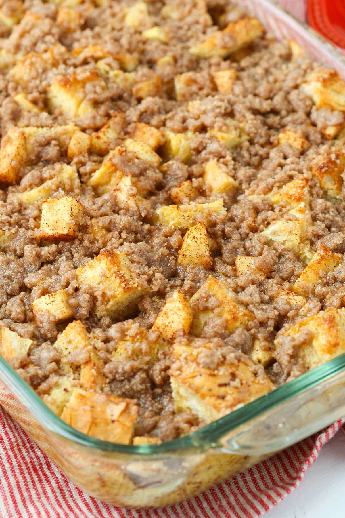 A casserole dish of overnight cinnamon apple French toast casserole.