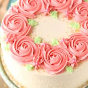 Top view of a raspberry almond layer cake.