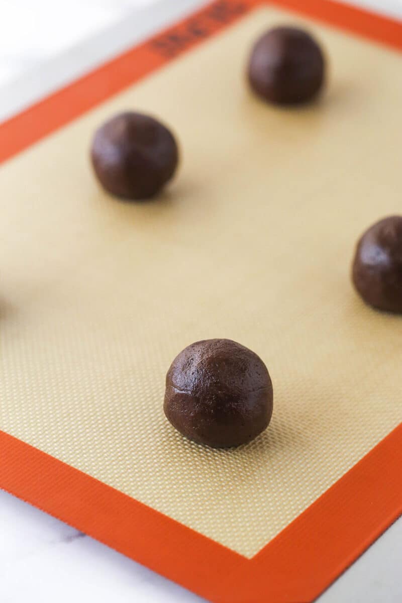 Caramel stuffed cookies waiting to be baked.