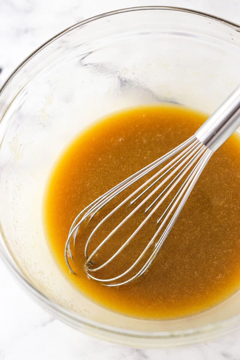 Whisking together butter and brown sugar for blondie batter.
