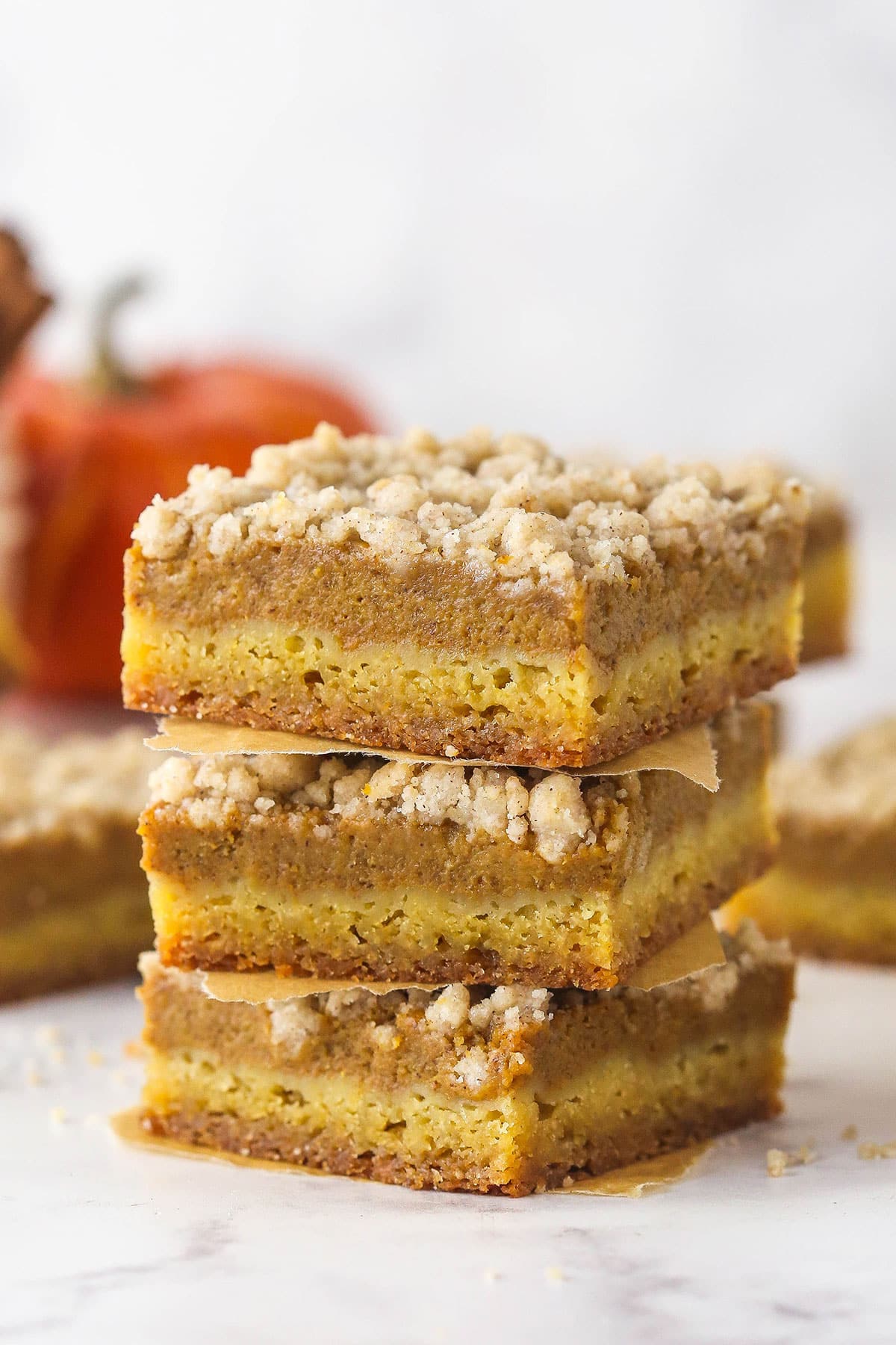 A stack of pumpkin pie blondie bars.