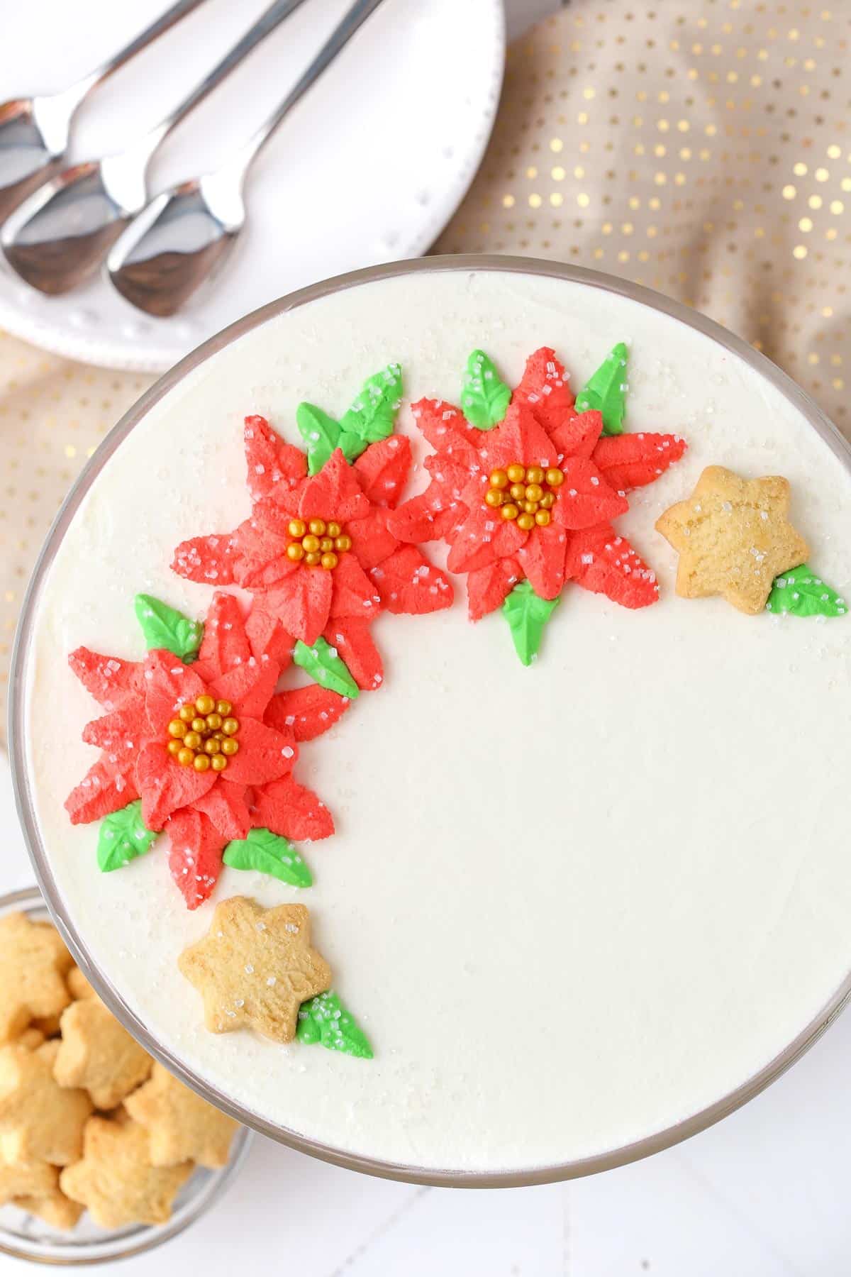 The top of a decorated red velvet shortbread trifle.