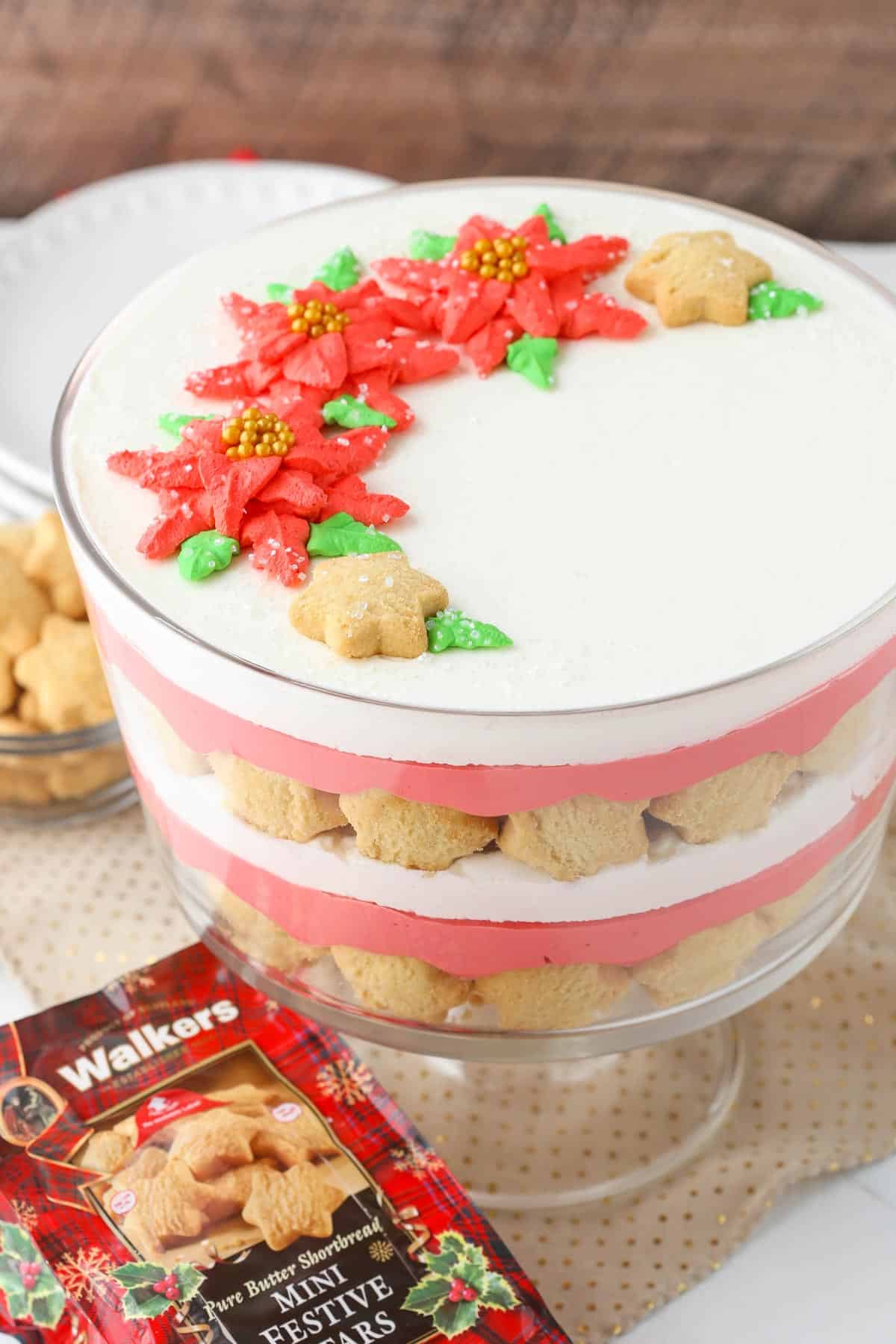 Overhead view of the side and top of a red velvet shortbread trifle.