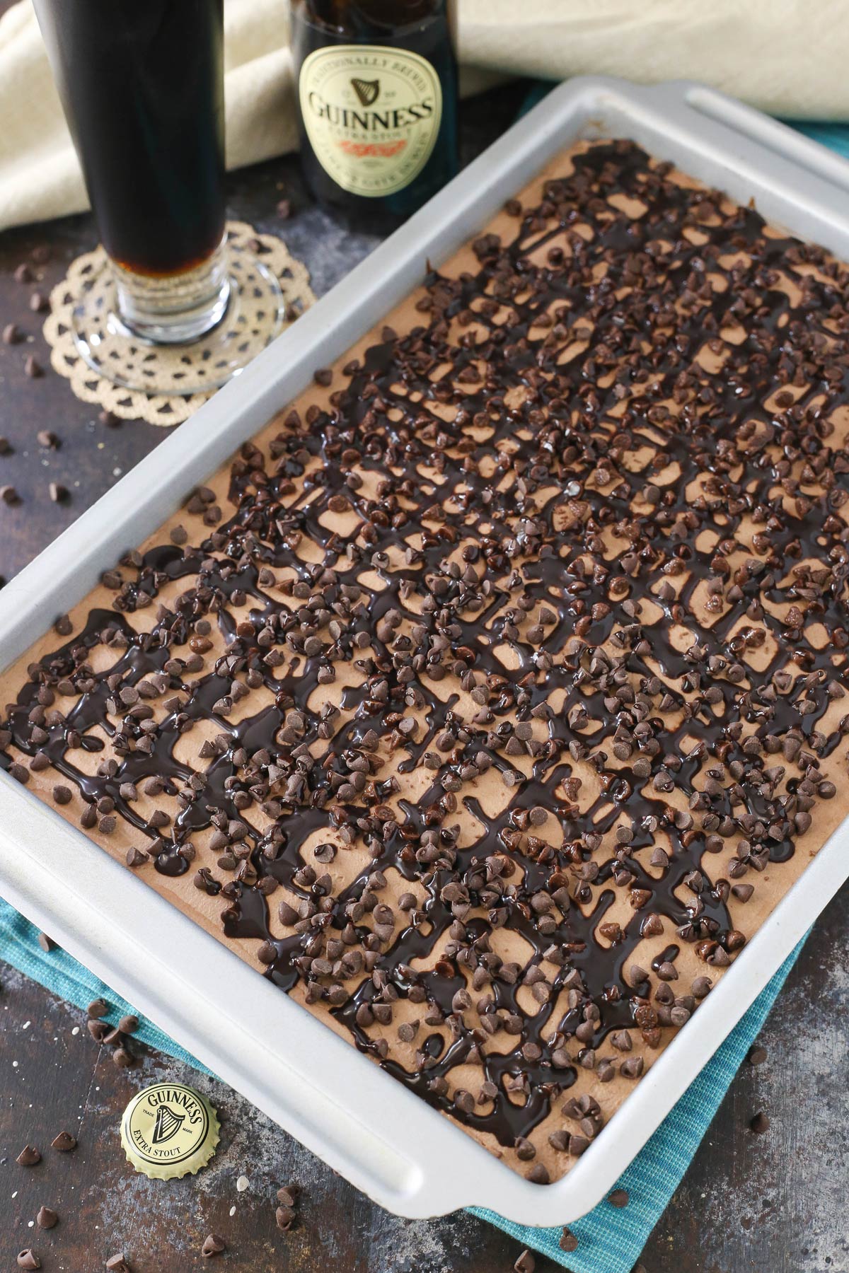 Top view of a Guinness chocolate poke cake in a baking dish.