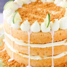 Close up of a key lime cake on a light green cake stand.