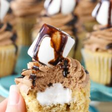 Close up of a Nutella fluffernutter cupcake with a bite taken out of it.