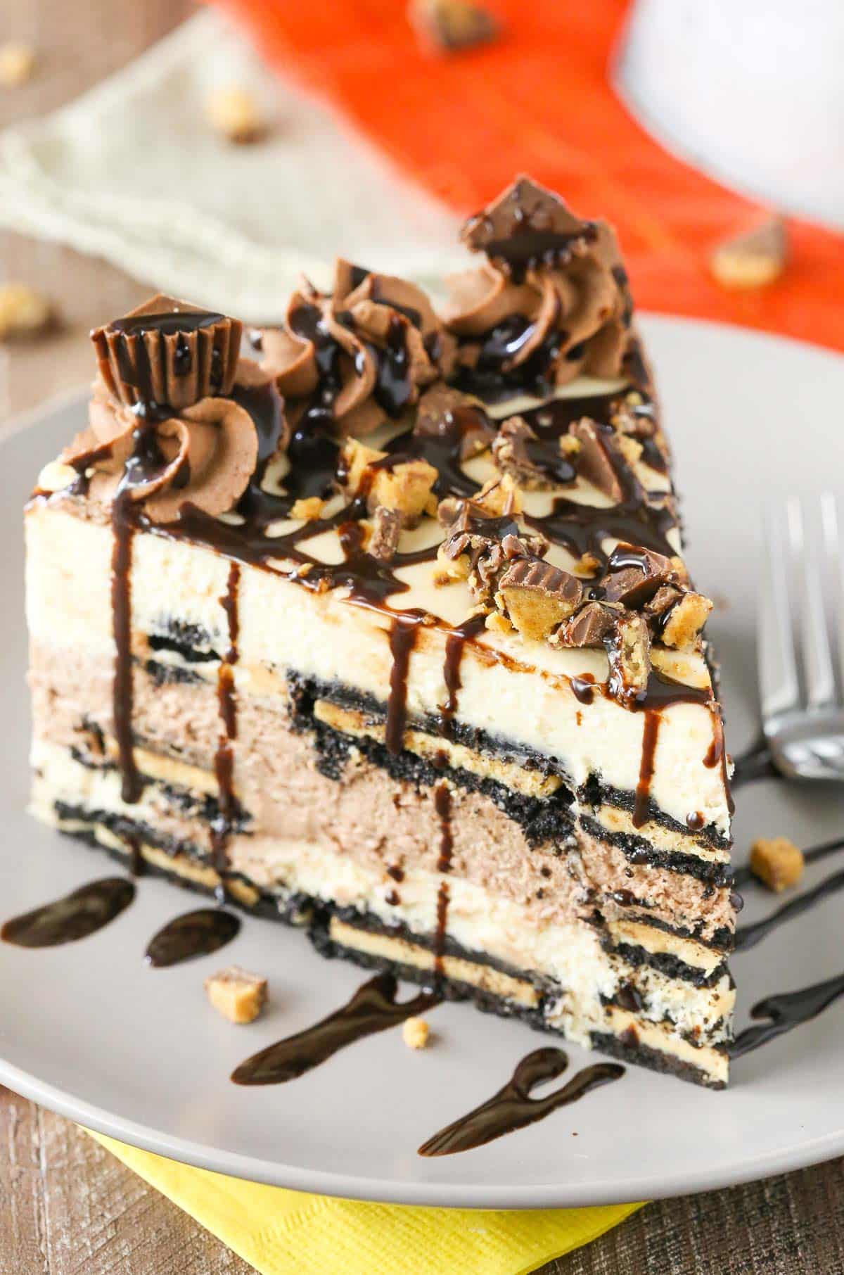 A slice of Reese's peanut butter chocolate icebox cake on a grey plate.