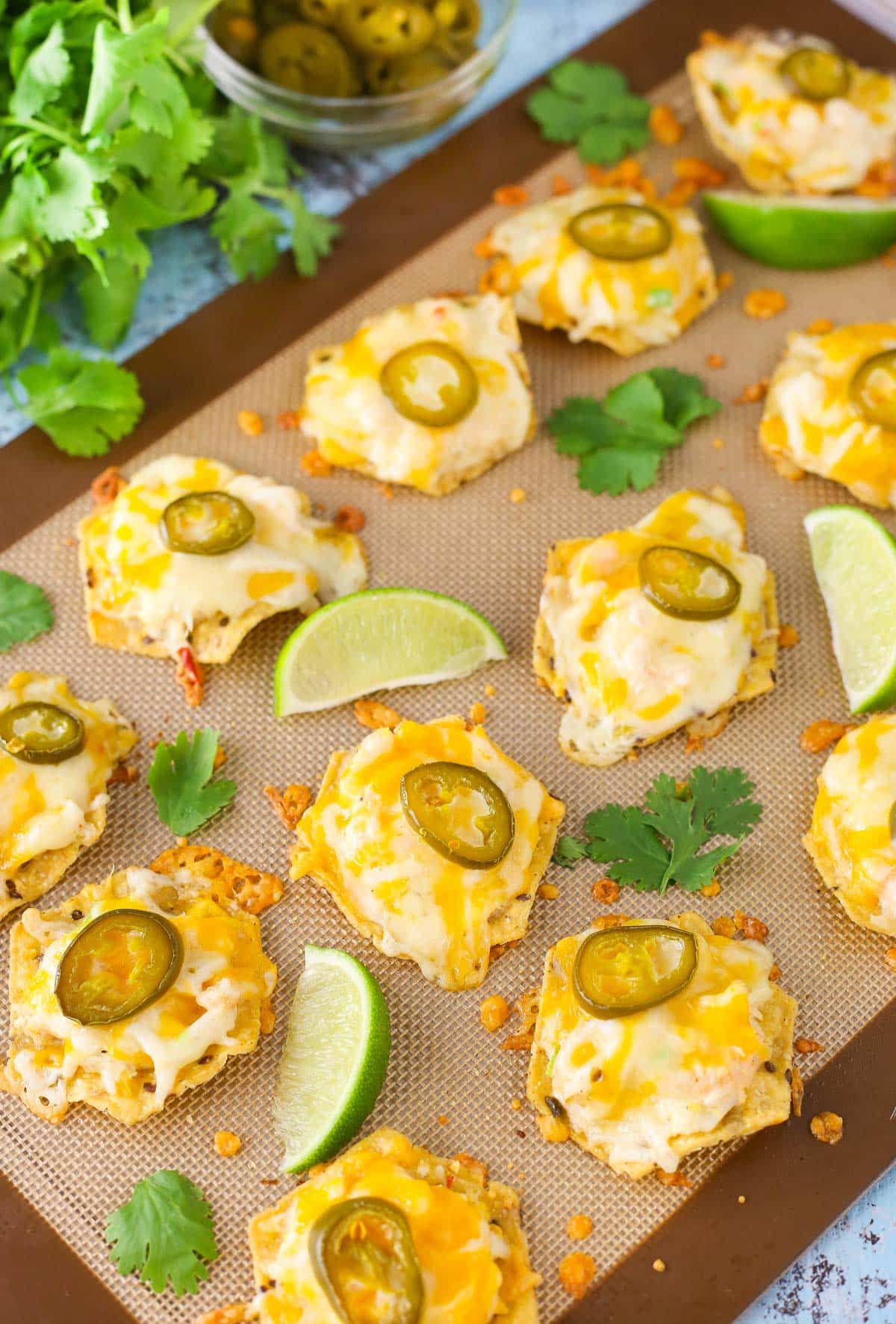 Shrimp and crab nachos on a silicone baking mat.