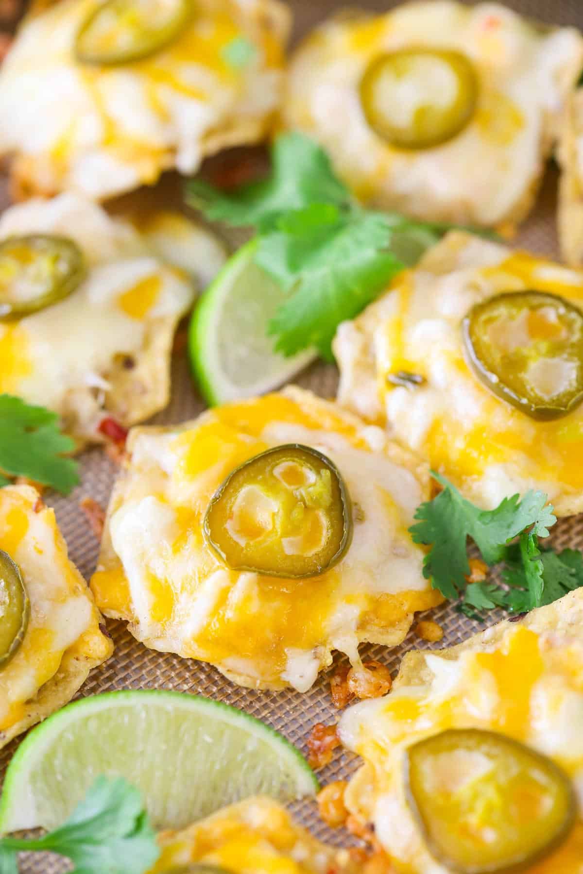 Shrimp and crab nachos on a silicone baking mat.