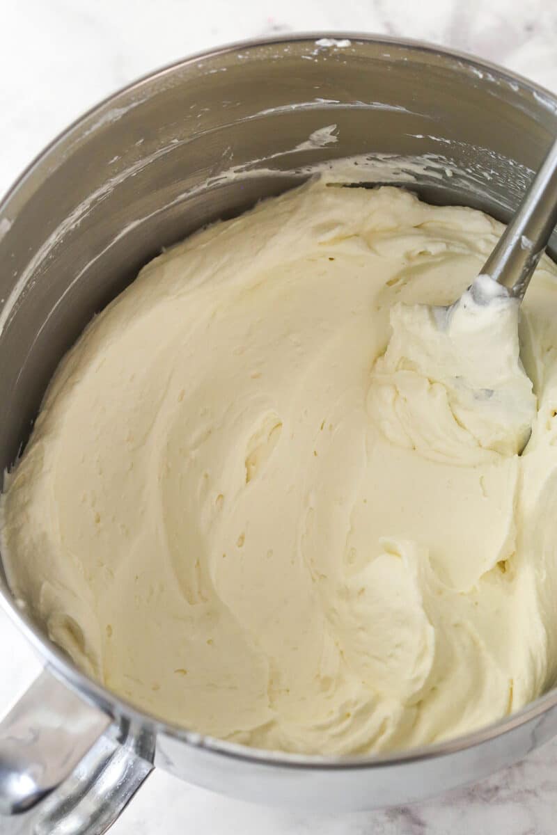 Whipped cream cheese frosting in a bowl.