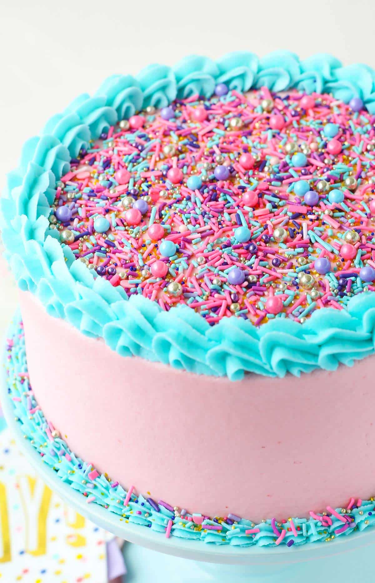 Close up of a strawberry layer cake.
