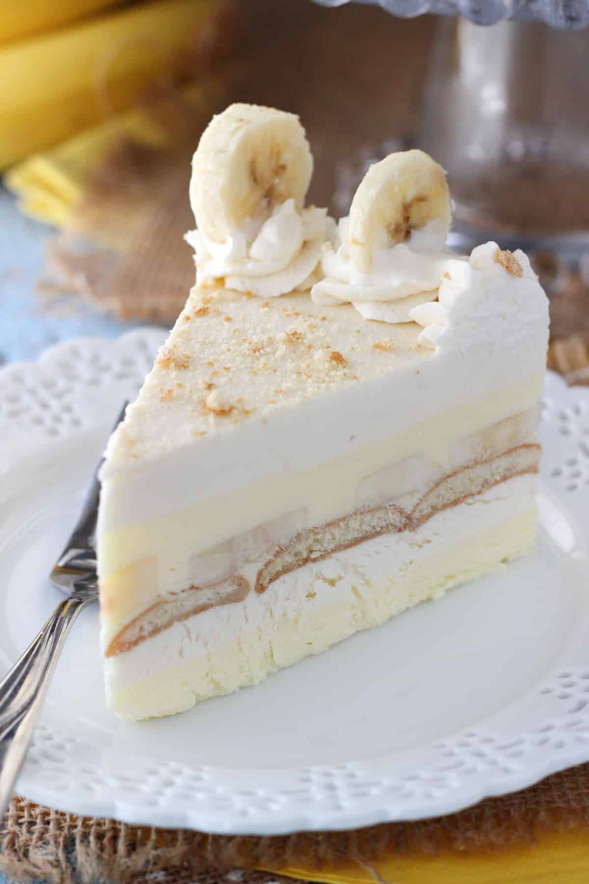 A slice of banana pudding icebox cake on a white plate.