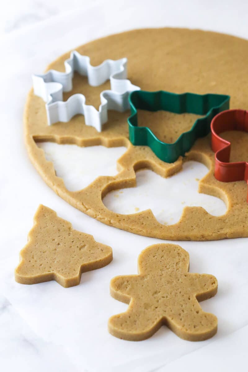 These brown sugar cutout cookies are the best! Browning the butter gives them a nutty, caramelized flavor and a dreamy, soft, chewy texture. Cutting Christmas shapes from brown butter sugar cookie dough.