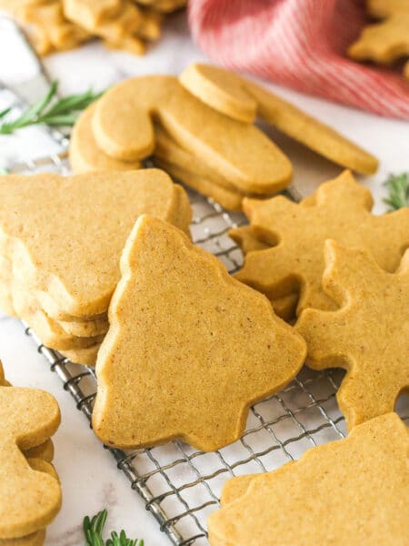 Brown sugar cutout cookies on a cooling rack.