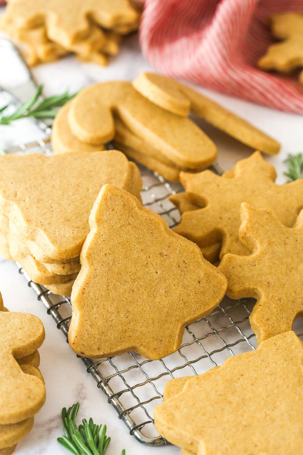 Brown sugar cutout cookies on a cooling rack.