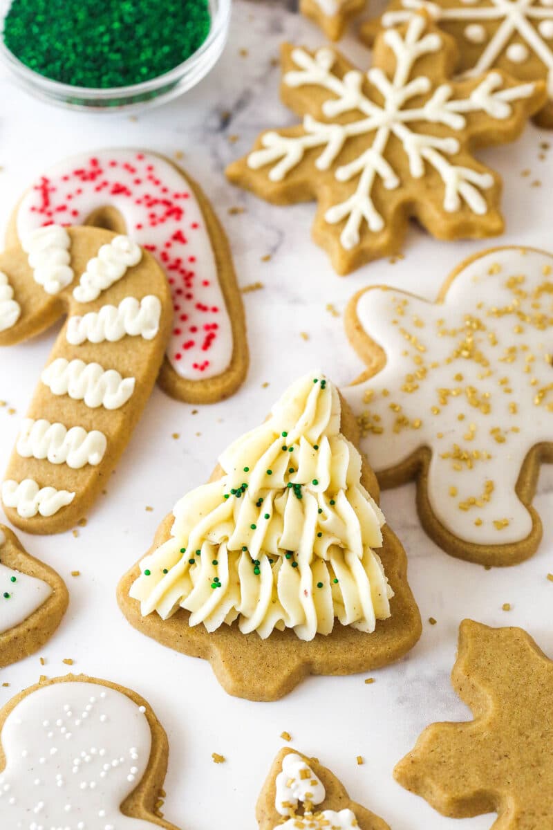 Brown sugar cutout cookies decorated with brown butter buttercream and royal icing.