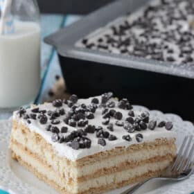 A slice of cannoli icebox cake on a small white plate.