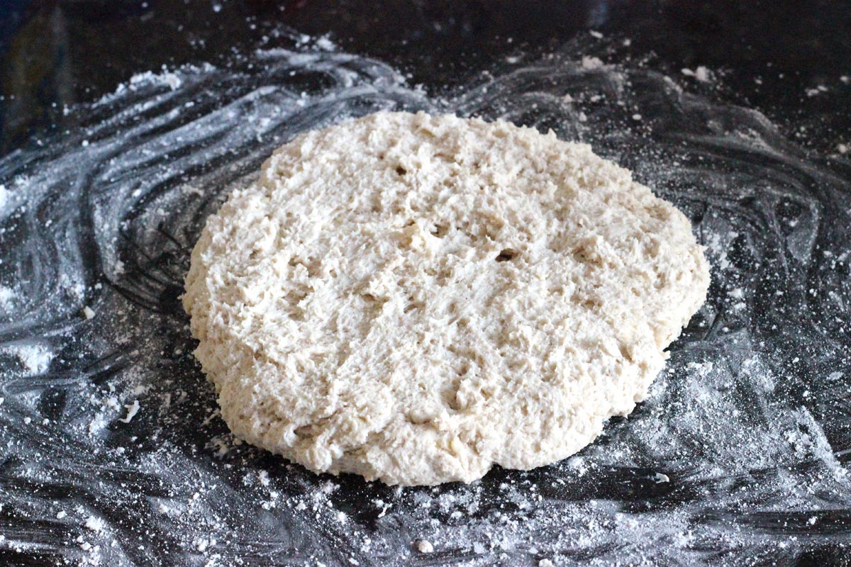 Shaggy dough on a flour dusted surface.