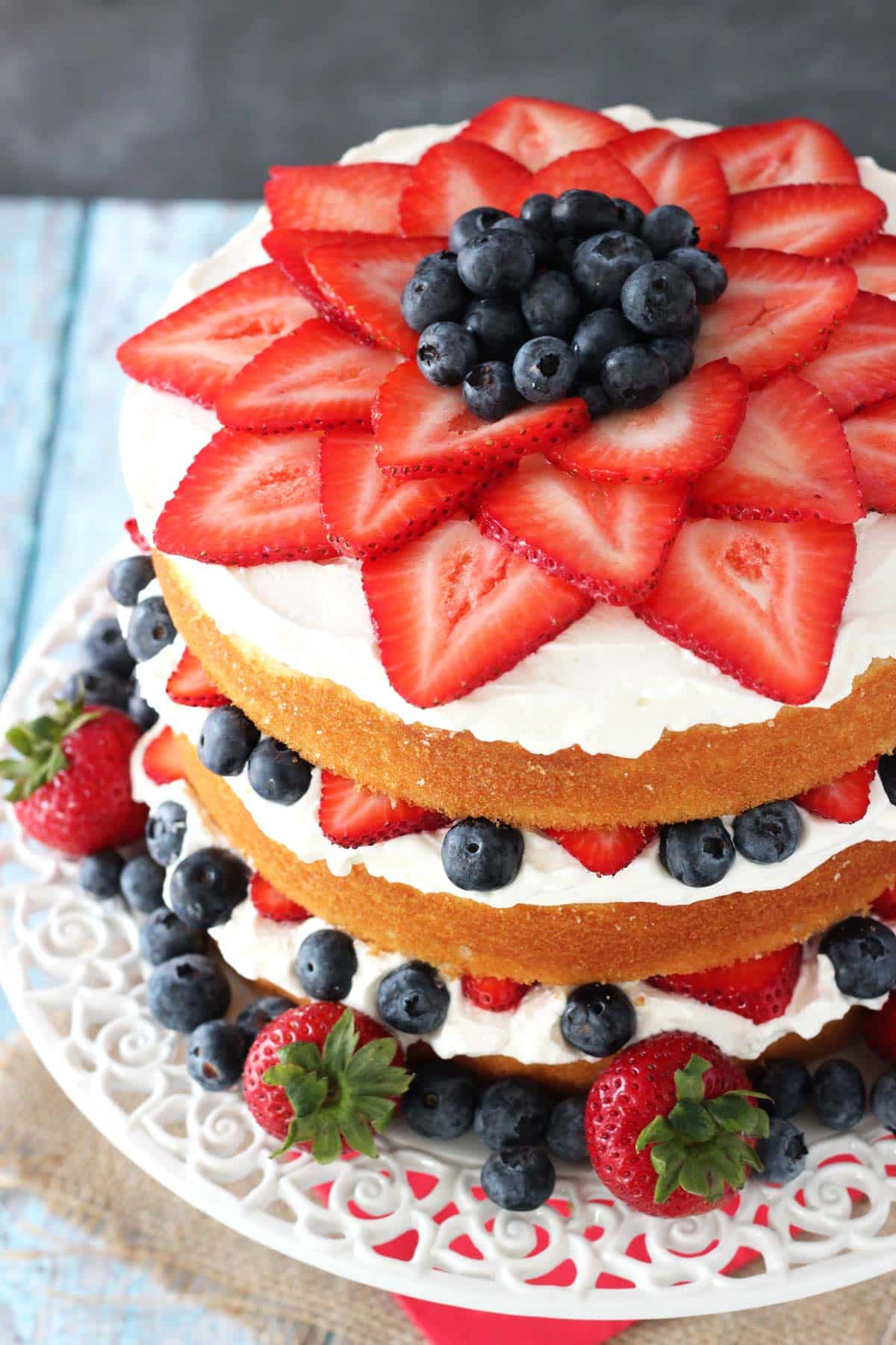 Top view of a fresh berry vanilla layered cake.