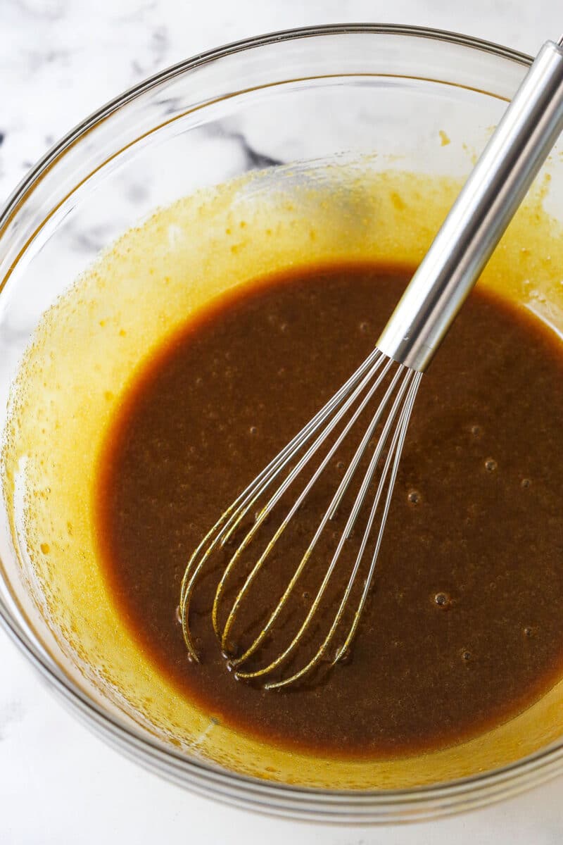 Gingerbread cake roll is a fun alternative to the classic, featuring a moist, spiced cake wrapped around a caramel and cream cheese filling. Whisk together egg yolks, brown sugar, molasses, sour cream, oil, and vanilla.