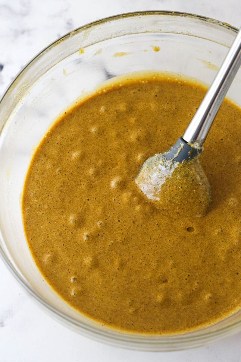 Gingerbread cake roll is a fun alternative to the classic, featuring a moist, spiced cake wrapped around a caramel and cream cheese filling. Fold the egg whites into the gingerbread cake batter.