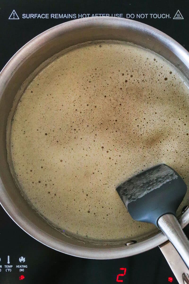 butter with foam on top, beginning to brown