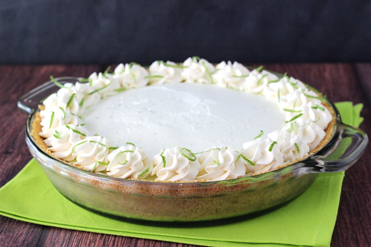 A no bake margarita pie in a glass pie plate.