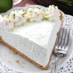 A slice of no bake margarita pie on a white plate.